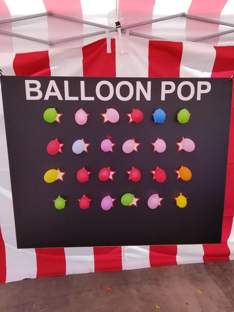 Balloon darts carnival game