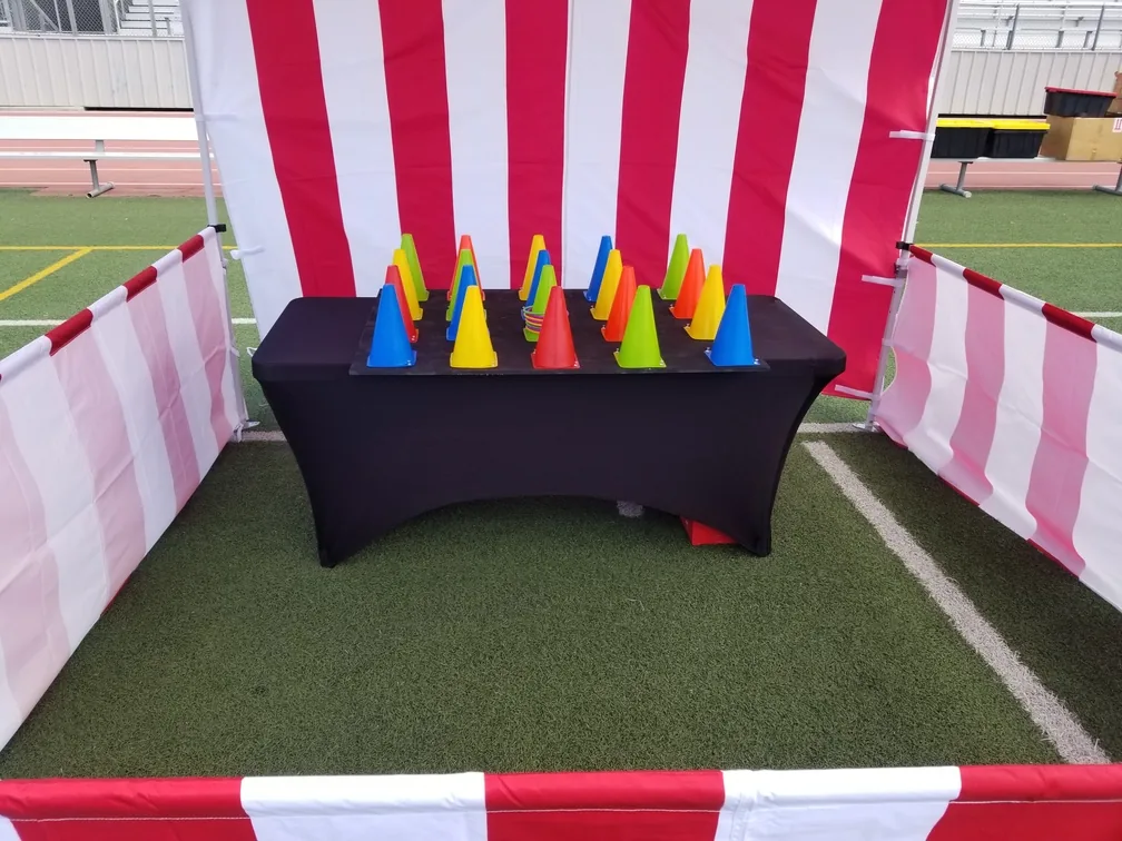 Ring toss carnival game with colourful cones